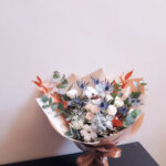 Blue cream preserved cotton and fresh wrapped bouquet - lizflorals